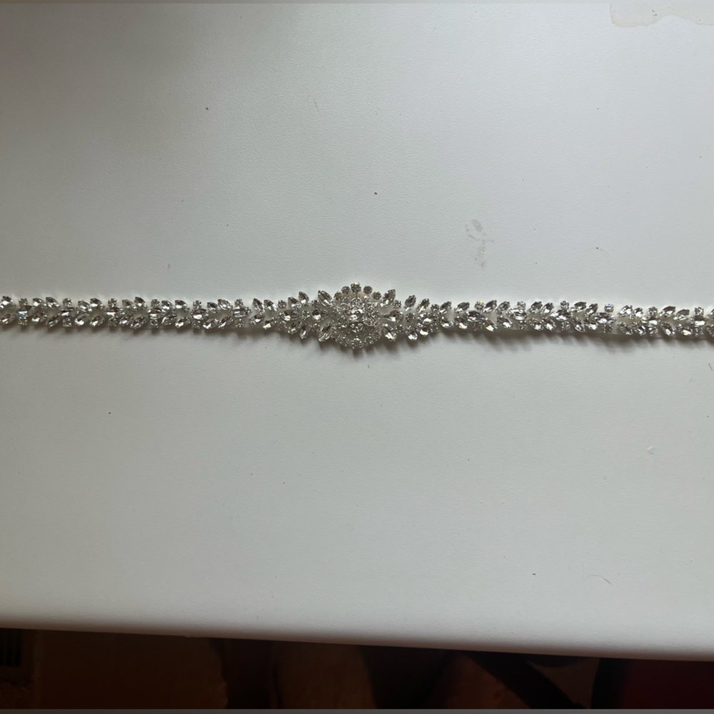 Brand New. Bridal rhinestone belt. New. Never worn. One size
